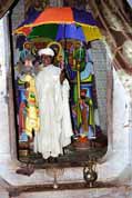 Priest in his monastery at Tana lake. He shows holy relics. North, Ethiopia.