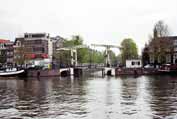 Water channel with bridge. Amsterdam. Netherlands.