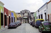 Street at historical center of Campeche city. You can see Puerta de Tierra.  Mexico.