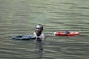 The salt is retrieving from the lake without any mechanization. Salt Lake, El Sod. South, Ethiopia.