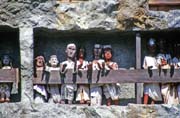 Tau tau figures in front of graves at Lemo. Tana Toraja area. Sulawesi, Indonesia.