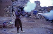 Hunter shows its musket. Begnimato village, Dogon country. Mali.
