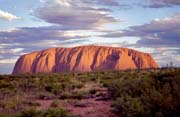 Ayers Rock (Uluru) in afternoon sun. It changes its color according the sunlight. Australia.