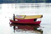 Boatman at Kuching city. Sarawak,  Malaysia.