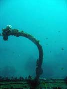 Wrack of steel Dutch merchant ship, sunk in 1942. Diving around Bunaken island, Molas Wreck dive site. Sulawesi, Indonesia.