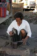 Blacksmith at Inle Lake market. Myanmar (Burma).