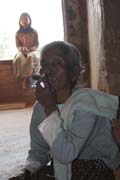 Lady is smoking hand made cigars, Bagan. Myanmar (Burma).