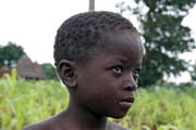 Boy from Somba tribe (also called Betamaribé people). Face is decorated by traditional scars. Boukoumbé area. Benin.