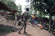 Somba man at traditional clothes. This tradition is almost disappeared. Local market at Boukoumb village. Benin.
