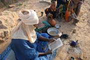 Holy Koran reading. Morning at campement of nomad Tuareg. Sahara desert. Niger.