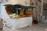 Fruit seller at Al-Mukalla port town. Yemen.