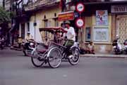 Cyclo in street of old Hanoi. Vietnam.