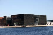 Black Diamond is called this building. It is Royal Danish Library building. Copenhagen. Denmark.