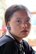 Girl from Eng tribe (sometimes called Ann or black teeth people), area around Kengtung town. Myanmar (Burma).