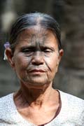 Woman from Chin tribe, Mrauk U area. Women have tradtionaly tattooed their faces. Myanmar (Burma).