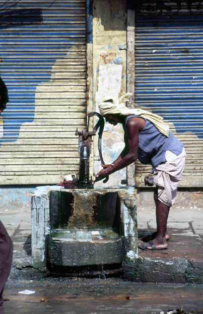 Public water pump (and bathroom also) at old Delhi. India.