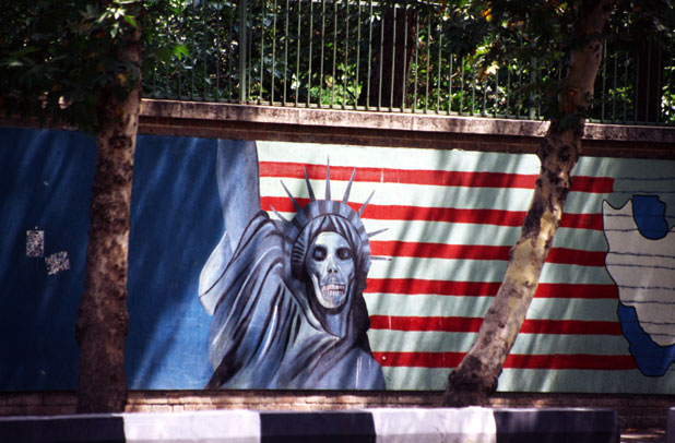 Political propaganda at walls of old US emabassy. Tehran. Iran.