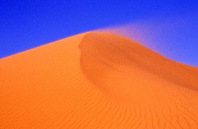 Sand dunes. Pyramids at Meroe. Sudan.