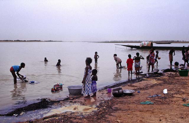 Life at bank of Niger river. River is giving food, drinking water and is also used for washing and as bathroom. Mali.