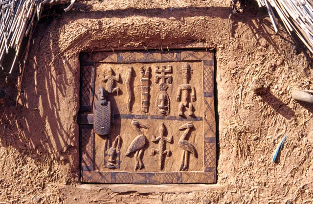 Decorated wood door. Dogon village Begnimato. Mali.