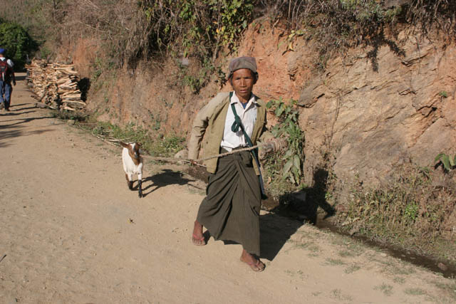 Village people an the way to larger village Mindat. Chin State. Myanmar (Burma).