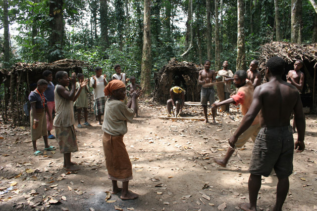 Traditional dance at Pygmy village down to the Lobe River. Cameroon.