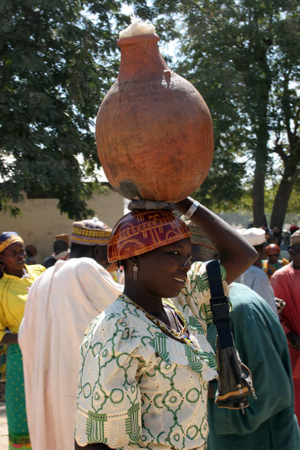 Everything is carried on the head. Market at Tourou village at Mandara Mountains. Cameroon.