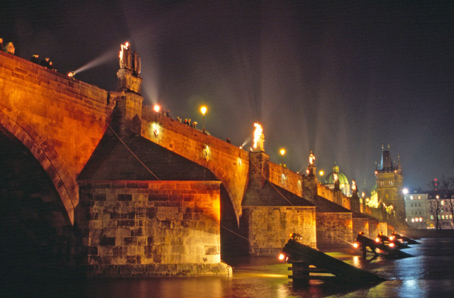 Special lighting at Charles Bridge during Orange Day, Praha. Czech Republic.