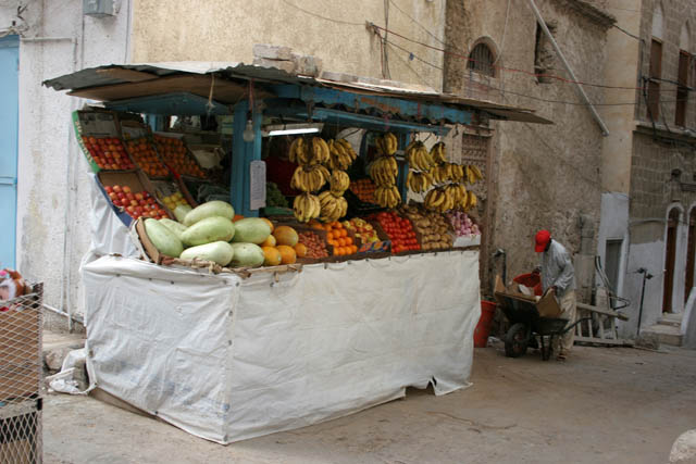 Fruit seller at Al-Mukalla port town. Yemen.
