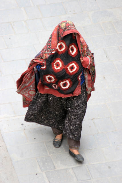 Women at traditional clothes at street at old quarter of Sana capitol. Yemen.