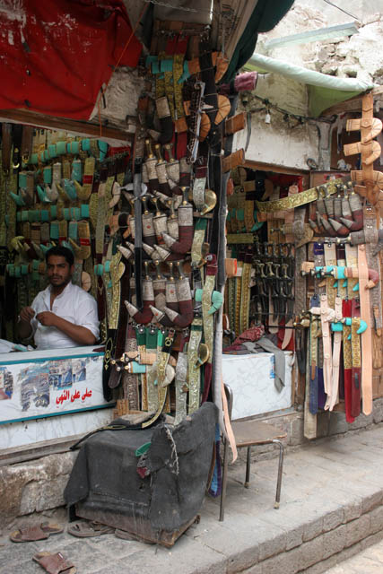 Shop with traditional daggers jambiya - almost every man is decorated by one. Market (souq) at old quarter of Sana city. Yemen.