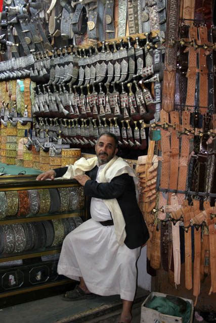 Shop with traditional daggers jambiya - almost every man is decorated by one. Market (souq) at old quarter of Sana city. Yemen.