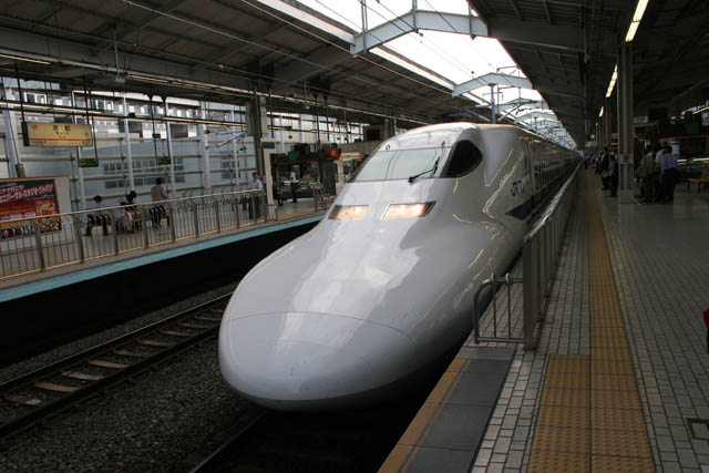 Shinkansen express train. Train station at Kyoto. Japan.