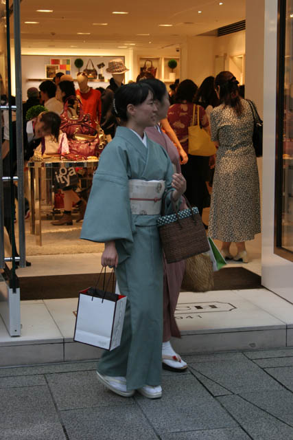 Traditions and moder life - contrasts - it is also Ginza district, Tokyo. Japan.