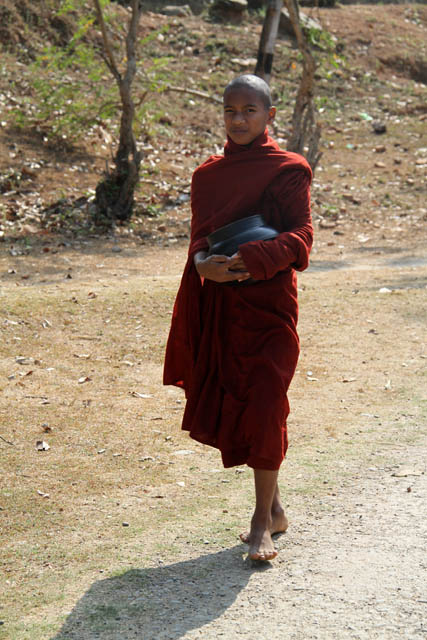 Buddhist monk at his way, Mrauk U. Myanmar (Burma).