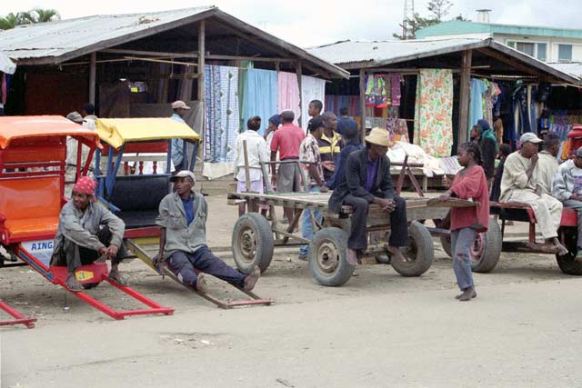 Local transport pousse-pousse, Moramaga. Madagascar.
