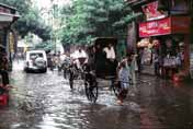 Monsun rain and rikshaws. Calcutta. India.