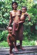 Young mentawai woman with children. Siberut island. Sumatra,  Indonesia.