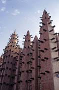Prayer towers of mosque built at sahel architecture style. Small village near Mopti. Mali.