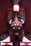 Batac mask uses for house decorating. Lake Toba, Samosir island. Sumatra, Indonesia.