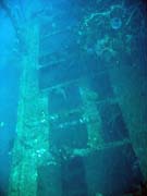 Wrack of steel Dutch merchant ship, sunk in 1942. Diving around Bunaken island, Molas Wreck dive site. Sulawesi,  Indonesia.