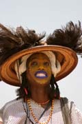 Man from nomadic Wodaab tribe during performace of Yaake dance at Gerewol festival. Every man shows the teeth and rolls eyes. It makes them more beauty. Niger.