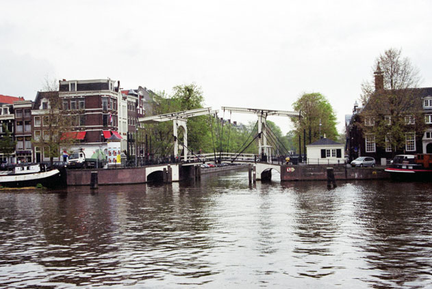 Water channel with bridge. Amsterdam. Netherlands.