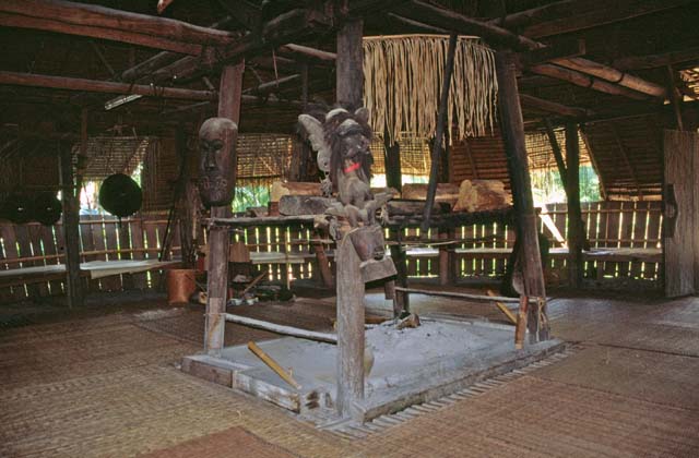 Inside of the longhouse - fire place is in the middle. Cultural village near Kuching. Sarawak,  Malaysia.