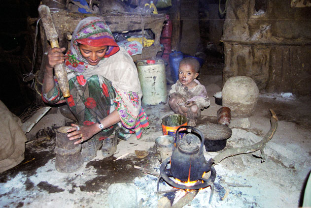 Coffee preparation during coffee ceremony. Local village at Simien mountains. North,  Ethiopia.